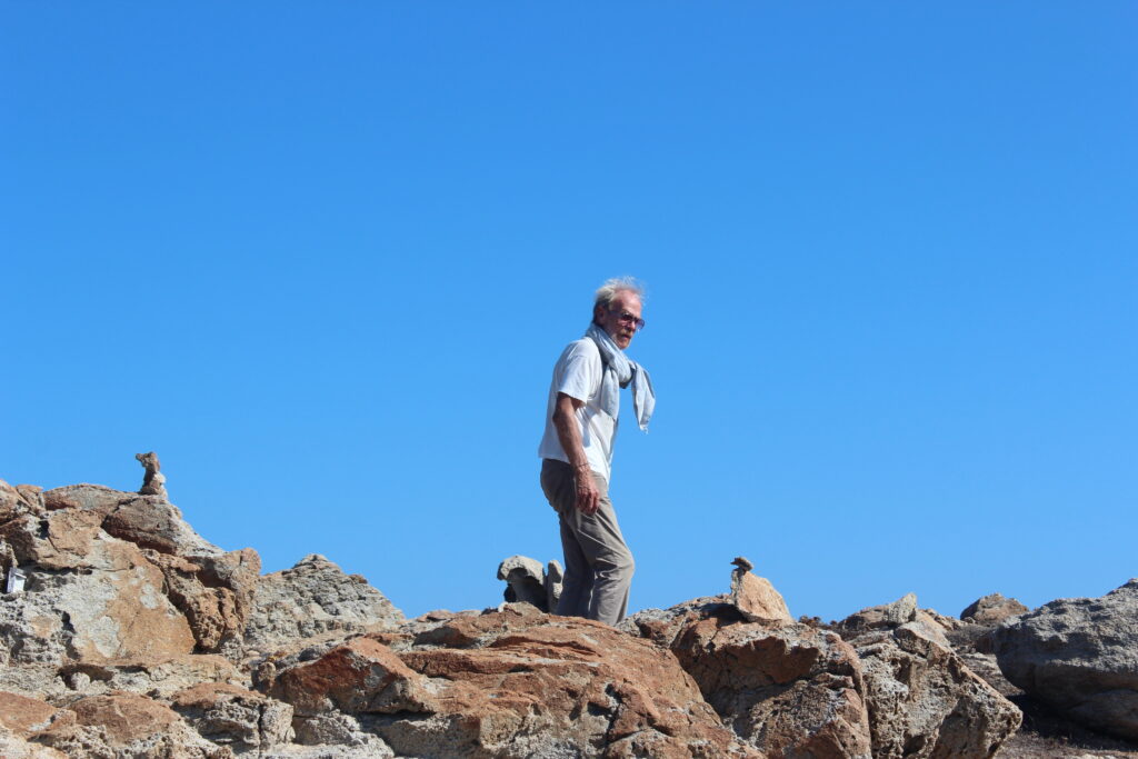 Klaus Pfeiffer walking on a hill in Naxos.